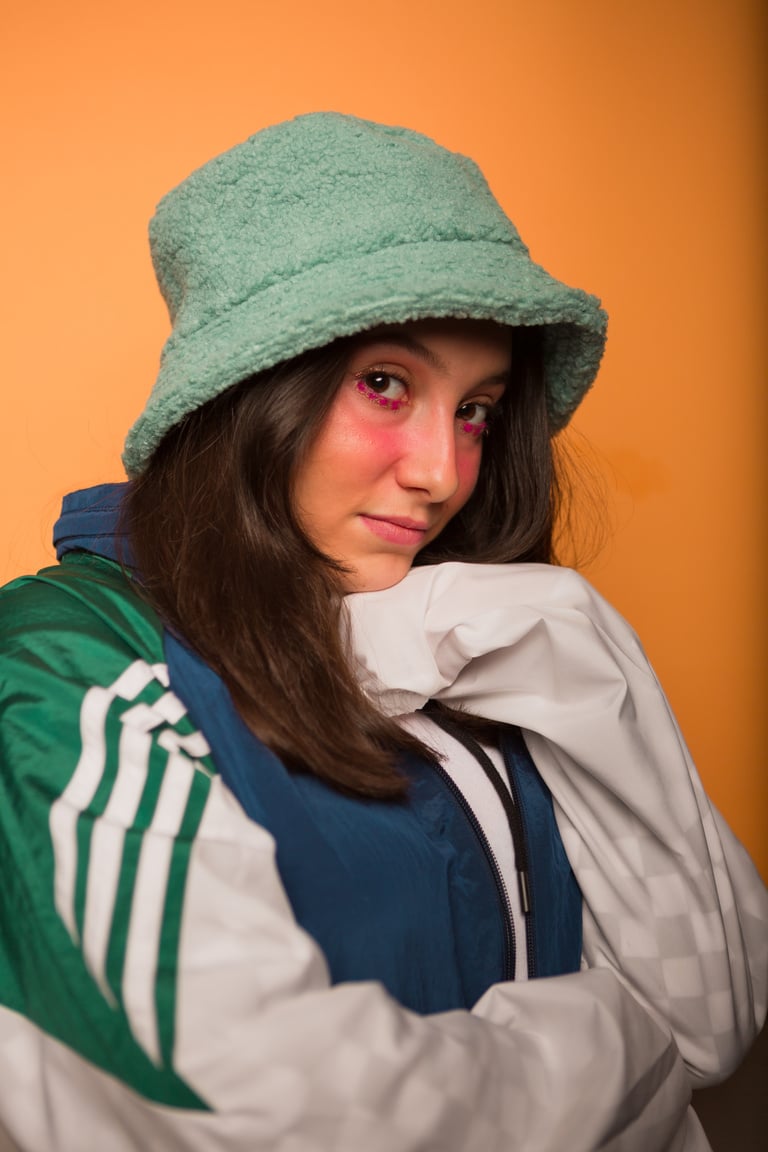 Woman with Bright Makeup and Cap